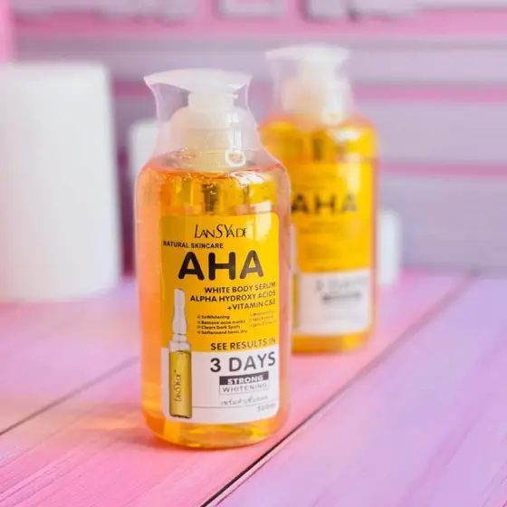 سرم روشن‌کننده و لایه‌بردار بدن LANSYADE (AHA + ویتامین‌ C و E)